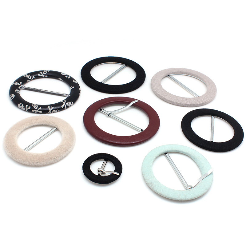 Hva er en stoffinnpakket spenne og hvorfor er det det ultimate valget for premium mote- og håndverksprosjekter